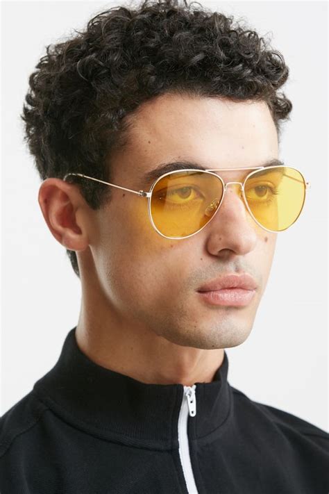 oversized yellow lens sunglasses.